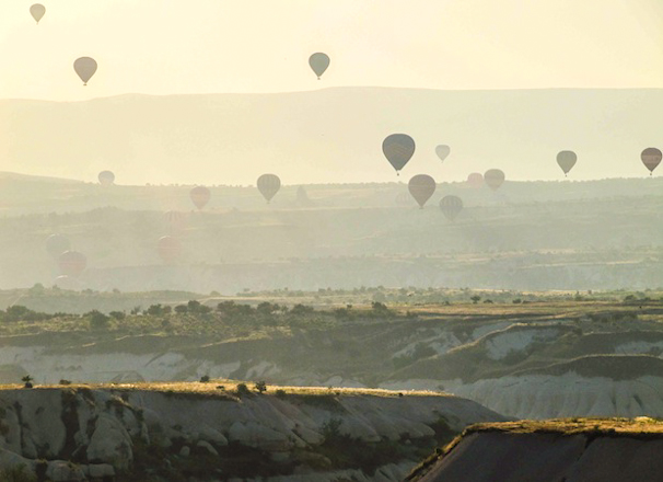 travel the world: hot air balloons over cappadocia at sunrise