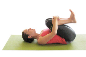 Knees to chest yoga